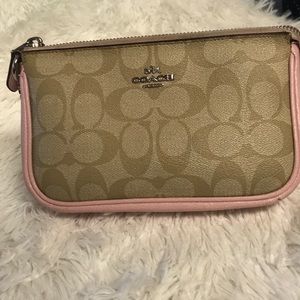 Pink clutch coach gently used